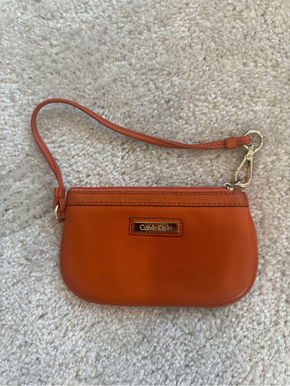 Calvin Klein Orange Leather Wristlet with Strap